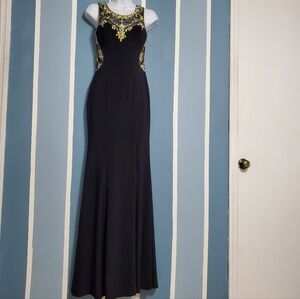 Betsy & Adam Elegant Black Gown with Gold Accents